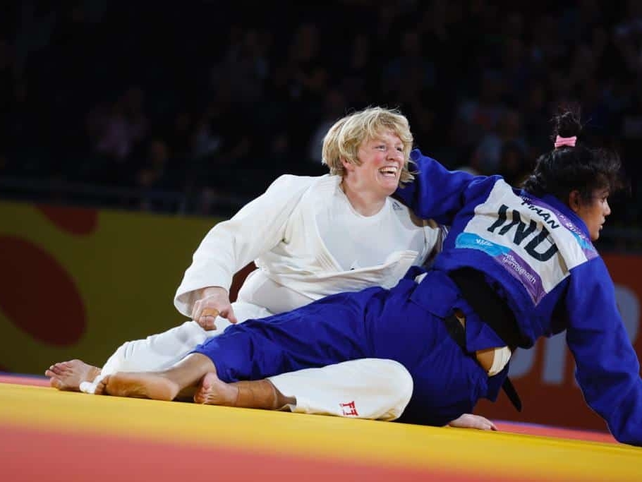 Sarah Adlington smiles as she secures her 2nd CWG Gold medal